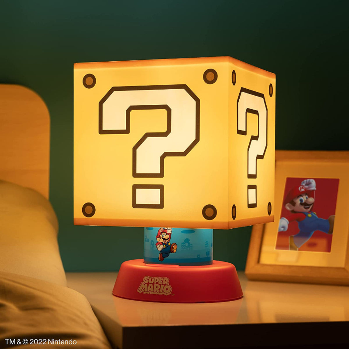 This is brand new.Super Mario Icon lamp: The Super Mario Icon Lamp can light up your space with its glowing Question Block and Mario who is underneath.